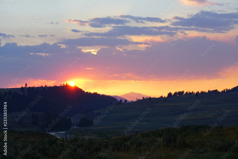 Beautiful sunset sky over Yellowstone National Park in Wyoming Beautiful sunset sky over Yellowstone National Park in Wyoming