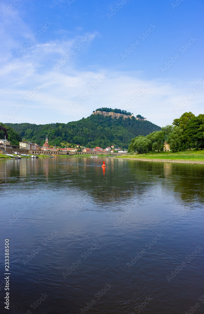 Beautiful view on Königstein castle from river Elbe in Saxony, Germany