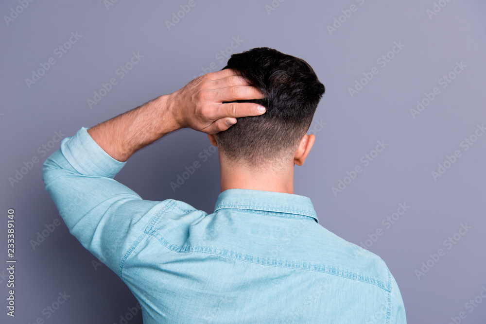 Rear back view of attractive cool confident content man wearing Rear back view of attractive cool confident content man wearing
