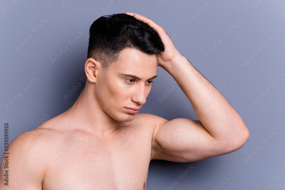 Close up portrait of half turn man stand isolated on gray backgr Close up portrait of half turn man stand isolated on gray backgr