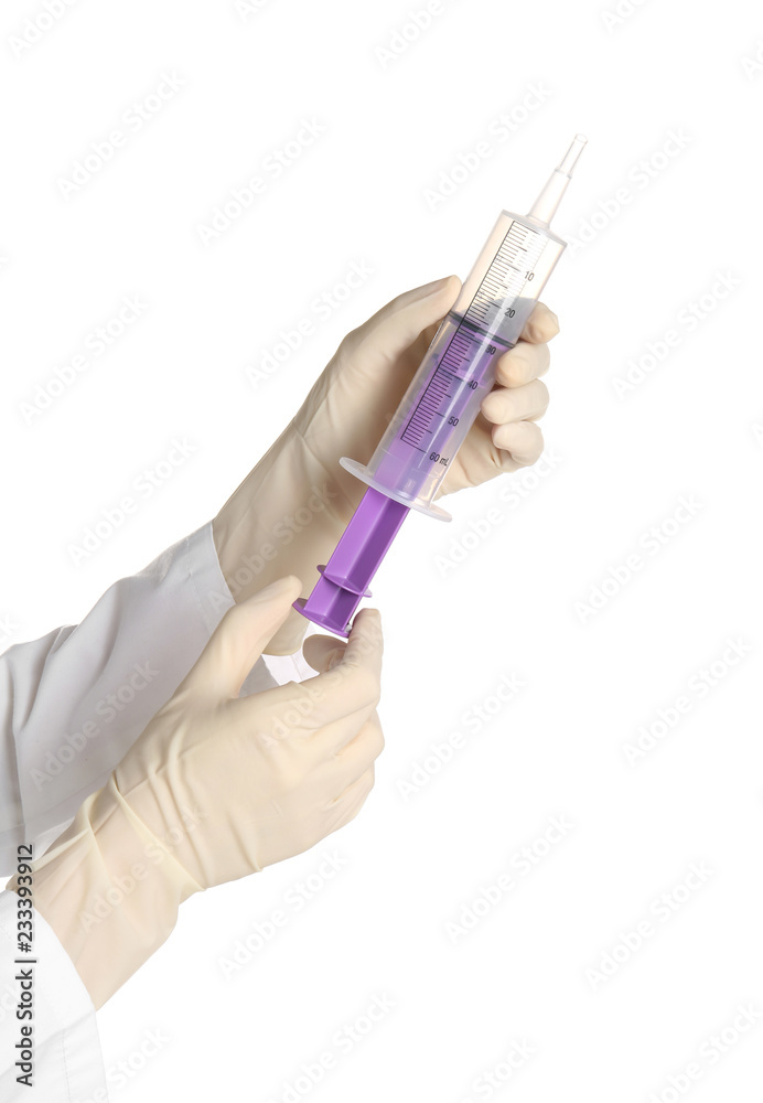 Doctor in medical gloves holding syringe on white background