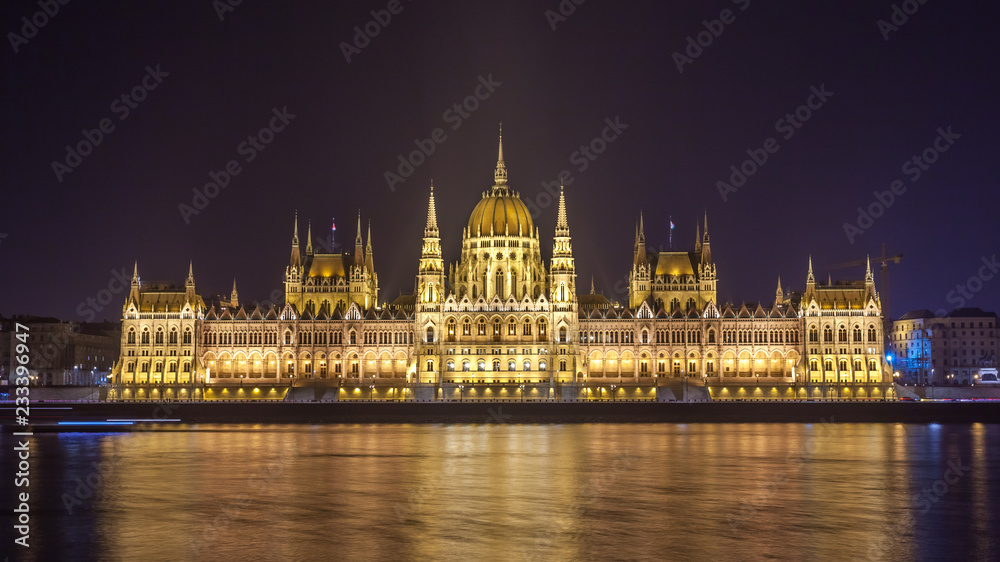 Hungarian Parliament Building on the bank of the Danube in Budapest at night
