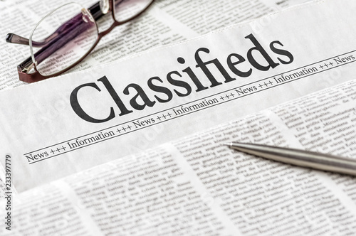A newspaper with the headline Classifieds
