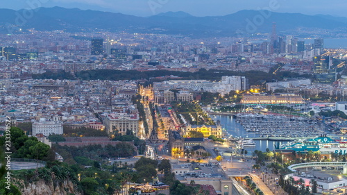 Aerial view over square Portal de la pau day to night timelapse in Barcelona, Catalonia, Spain.