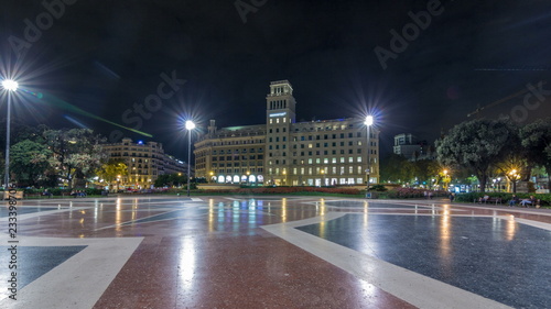 People at Placa de Catalunya or Catalonia Square night timelapse hyperlapse a large square in central Barcelona