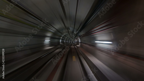 Moving in the subway tunnel with light trails inside timelapse