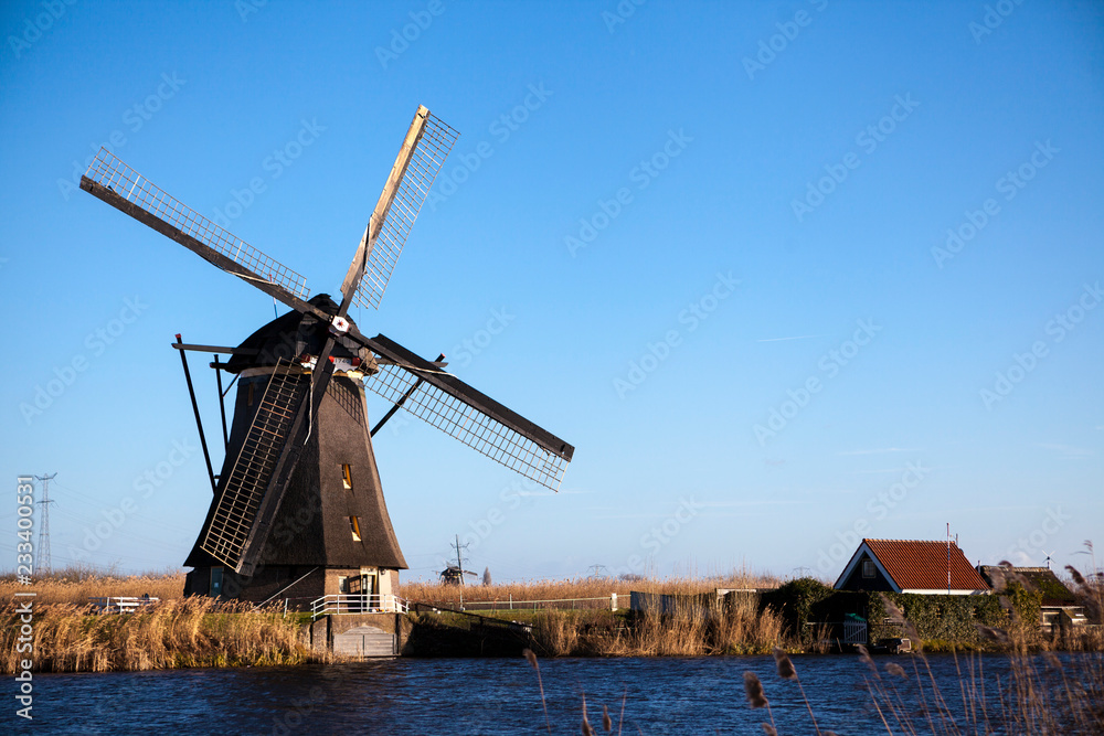 Dutch windmills, Holland, rural expanses . Windmills, the symbol of Holland.