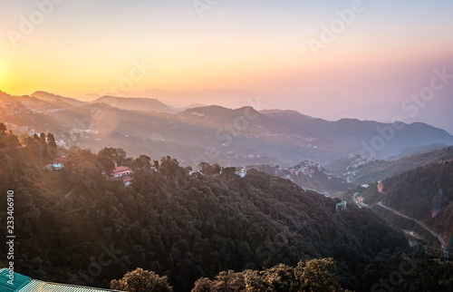 sunrise forming winter line in mussoorie India . layers of mountains top view © Peppygraphics