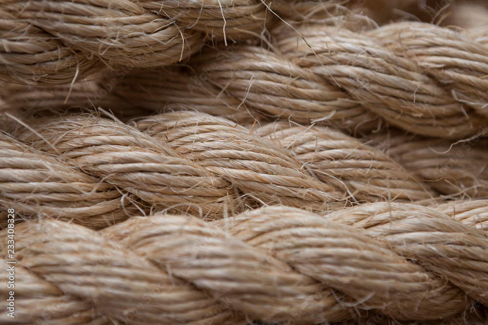 Fototapeta premium Roll of ship ropes as background texture