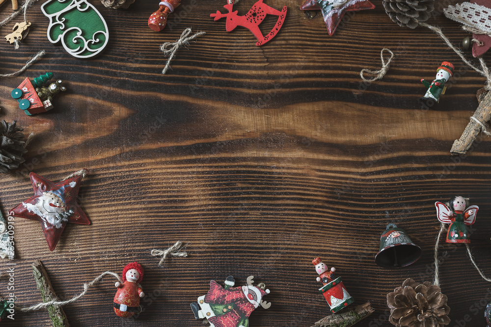 a lot colorful star toys on old wooden texture background. Empty copy space for inscription. Idea of merry new year 2019 holiday. Top view a lot colorful star toys on old wooden texture background. Empty copy space for inscription. Idea of merry new year 2019 holiday. Top view