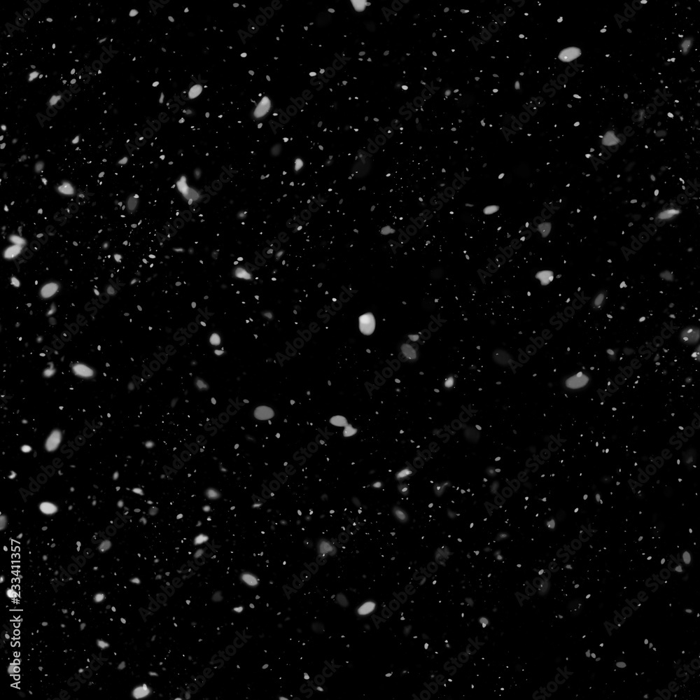 Isolated natural white snow texture effect on black night background. Winter snowflakes.