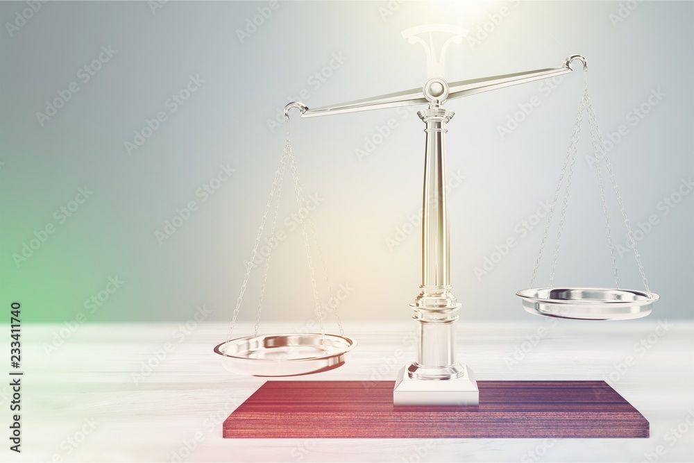 Law scales on table background. Symbol of justice Law scales on table background. Symbol of justice