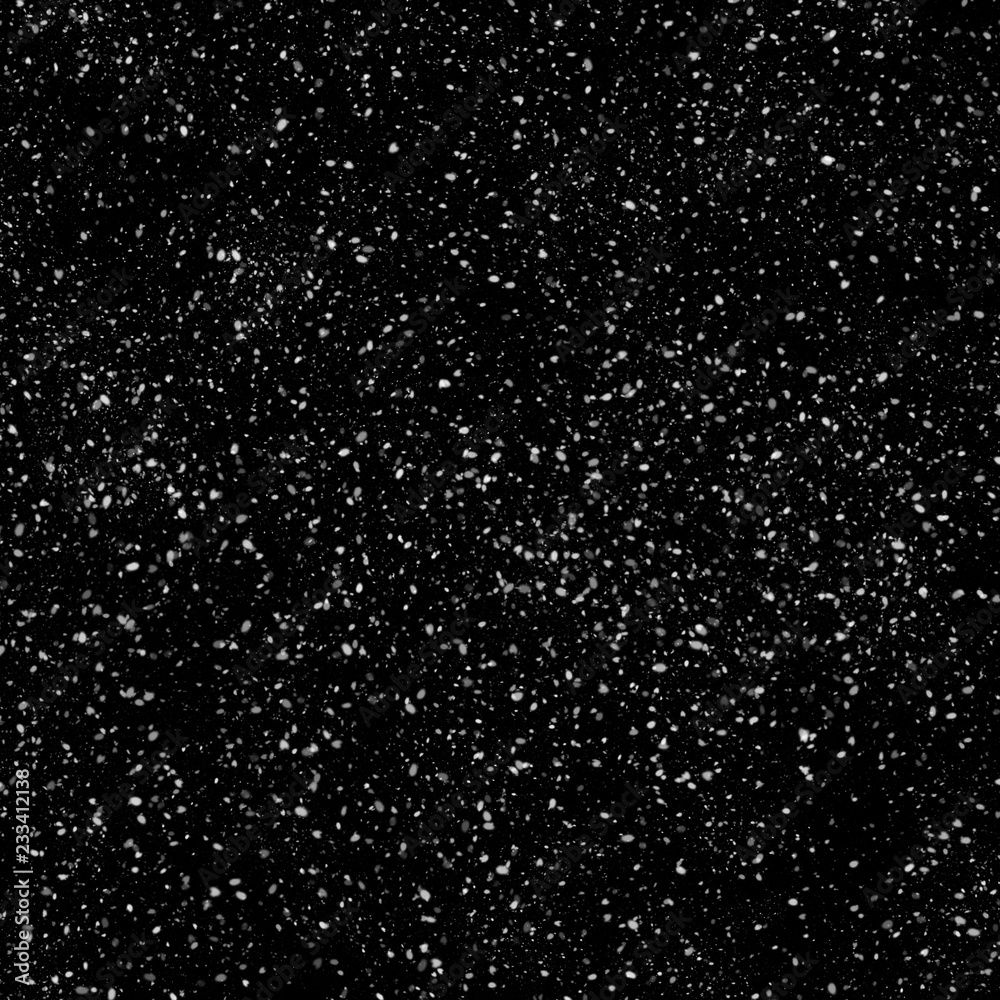 Isolated natural white snow texture effect on black night background. Winter snowflakes. Isolated natural white snow texture effect on black night background. Winter snowflakes.