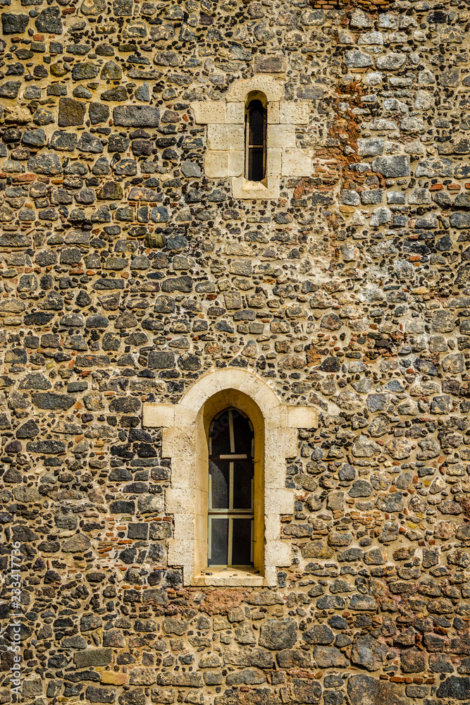 Naklejka premium old window in stone wall