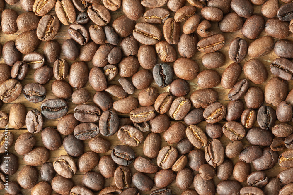 Dark and light roasted offee beans background. Dark and light roasted offee beans background.