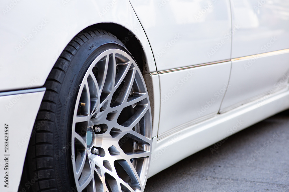 Close-up of the white stanced car wheel Close-up of the white stanced car wheel
