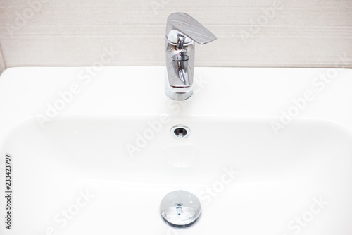 Close-up of ceramic white bathroom sink
