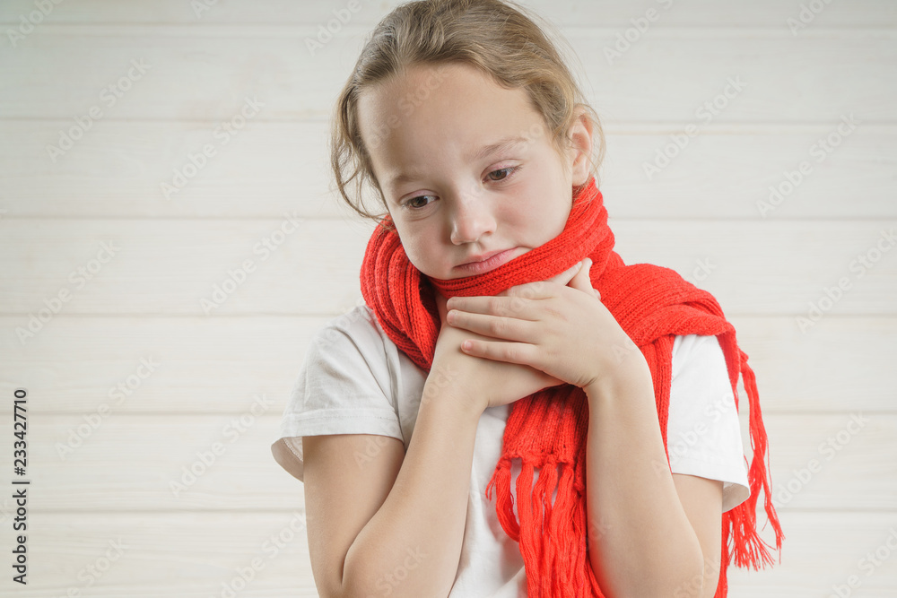 child temperature. sore throat. bad condition. a child rooting. scarf Stock  Photo | Adobe Stock