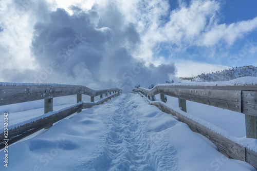 Yellowstone Geyser Steam And Footprints In Snow © davidmarx