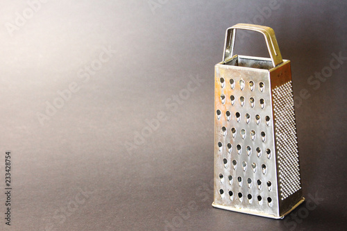 Iron hand grater for vegetables
