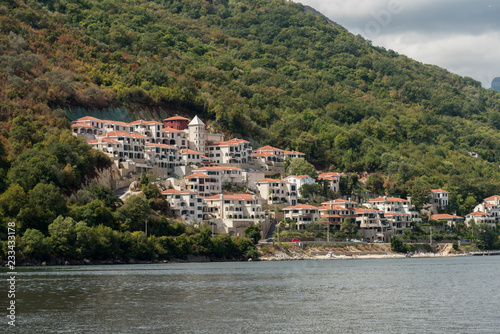 Villas and apartments at waterfront, Bay of Kotor, Montenegro © klevit