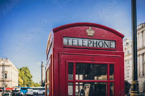 Red telephone box on neighborhood district of St. James in London, UK