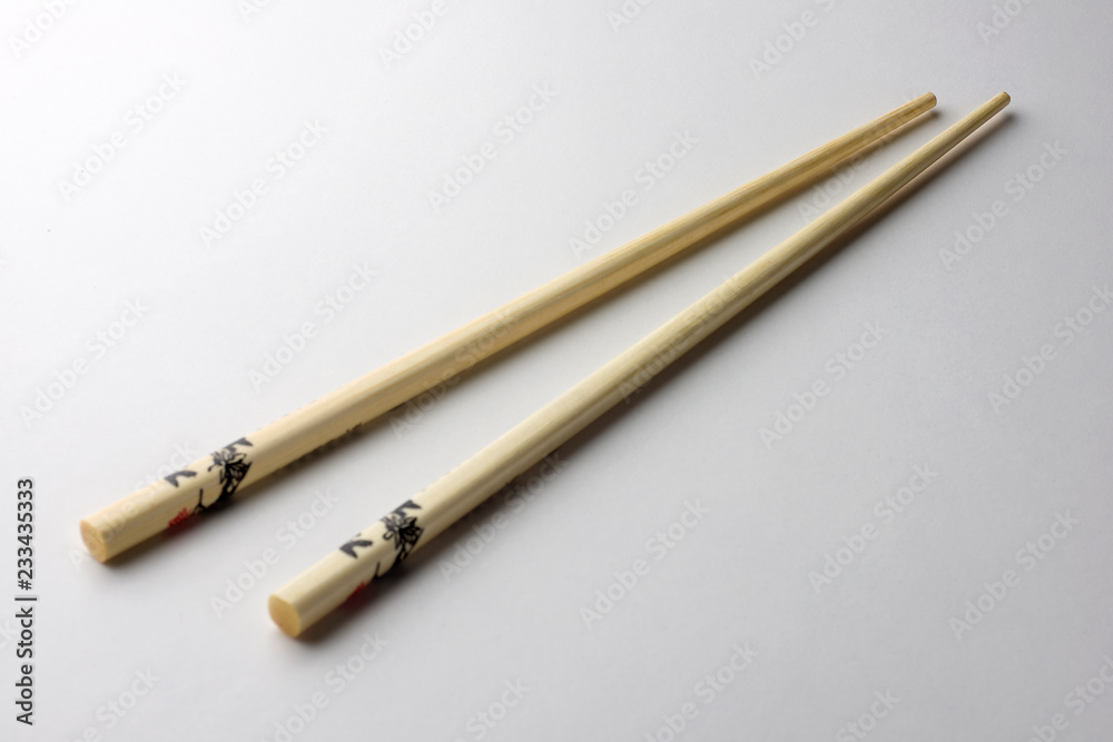 Rice chopsticks decorated on a white background Rice chopsticks decorated on a white background