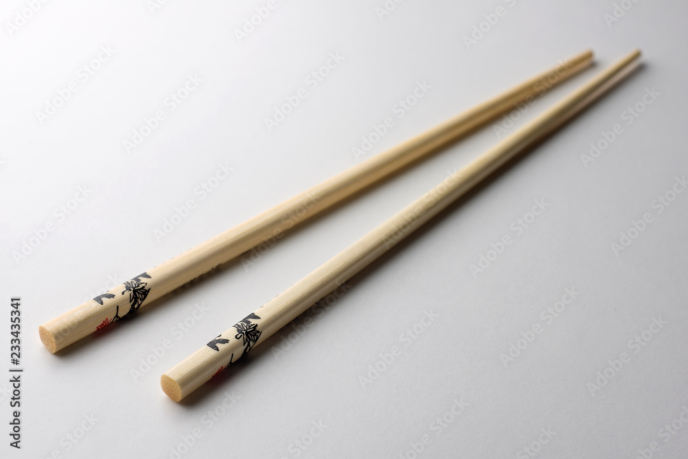 Rice chopsticks decorated on a white background Rice chopsticks decorated on a white background