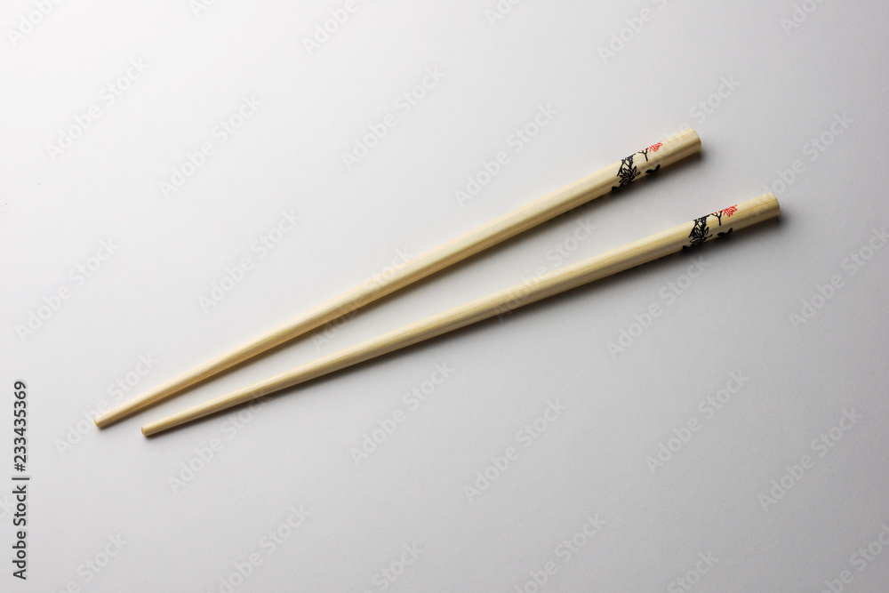 Rice chopsticks decorated on a white background Rice chopsticks decorated on a white background
