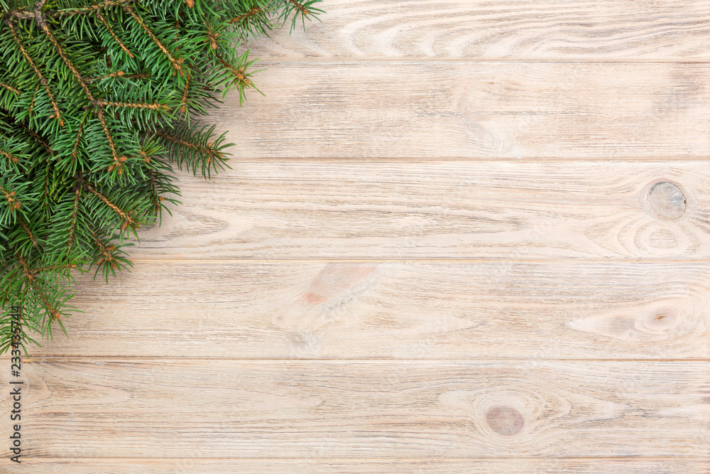Christmas gray wooden background with fir tree and copy space. top view empty space for your design Christmas gray wooden background with fir tree and copy space. top view empty space for your design
