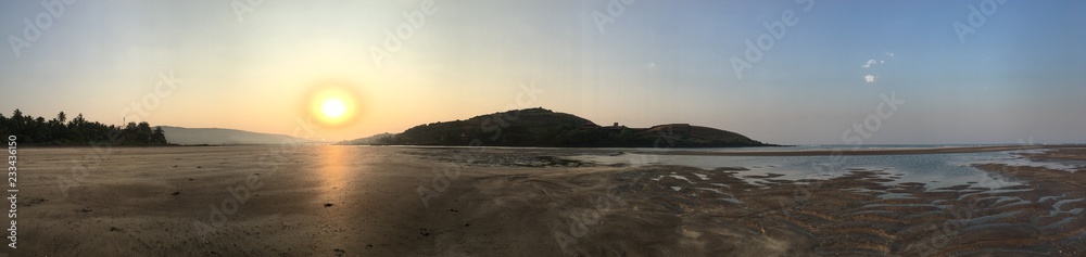 Panoramic view of sunset over the beach/sea coast