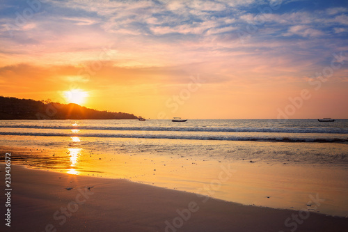 Fishing boats on the sunset near Jimbaran beach, Bali, Indonesia
