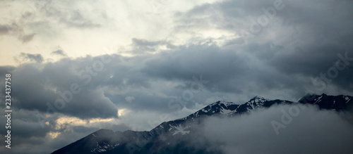 Panoramic Mountain Ridge and Dramatic Clouds © Brady
