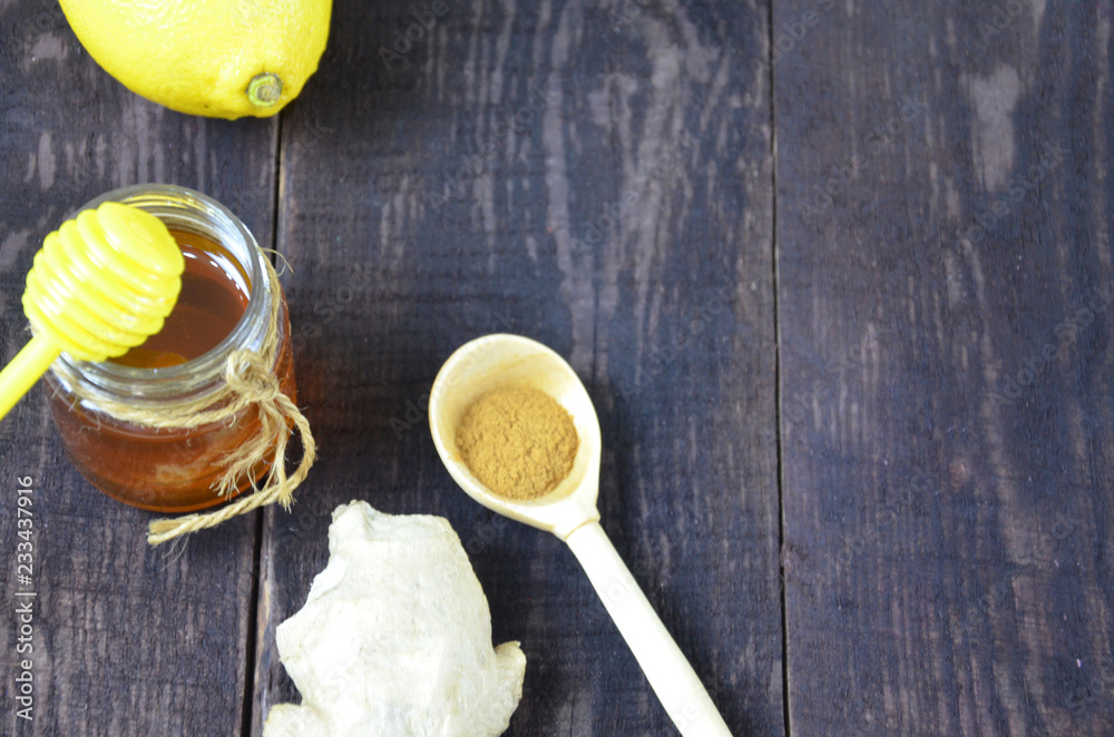 honey, lemon and ginger honey, lemon and ginger, turmeric for a hot drink for the treatment of colds on a wooden background honey, lemon and ginger honey, lemon and ginger, turmeric for a hot drink for the treatment of colds on a wooden background