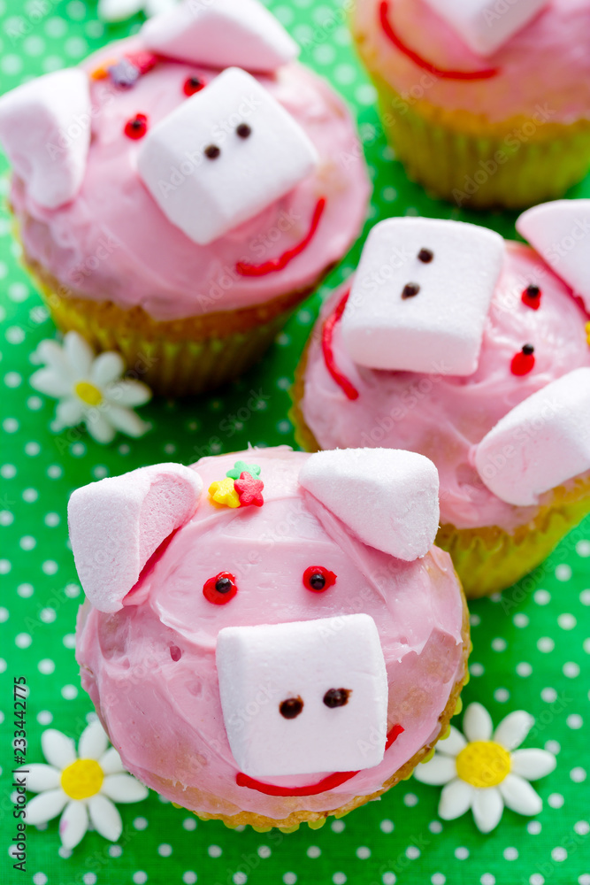 Pig cupcakes, animal shaped funny cakes for kids party, piggy cupcakes with pink frosting and marshmallow Pig cupcakes, animal shaped funny cakes for kids party, piggy cupcakes with pink frosting and marshmallow