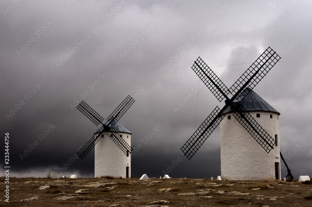 windmills on a stormy day 