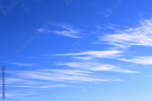 Thin white cirrus clouds. Background. Landscape.