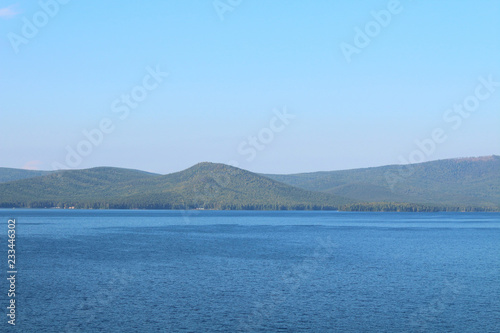 Beautiful view of the lake and the mountains. Background. Landscape.