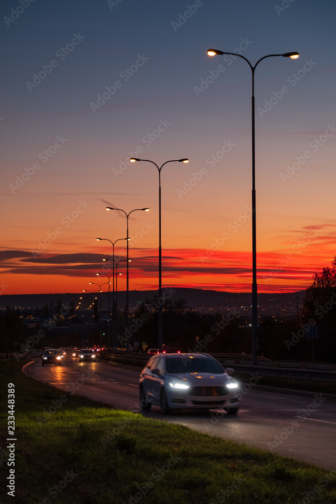 Evening  car traffic with color sky