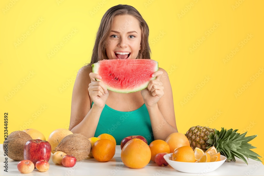 Portrait of young cute woman eating watermelon Portrait of young cute woman eating watermelon