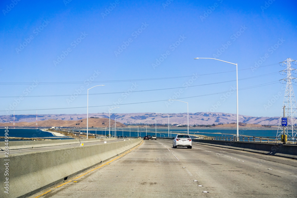 Travelling on Dumbarton bridge towards east San Francisco bay area, Silicon Valley, California