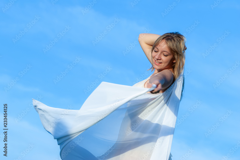 happy young girl on the sky background happy young girl on the sky background
