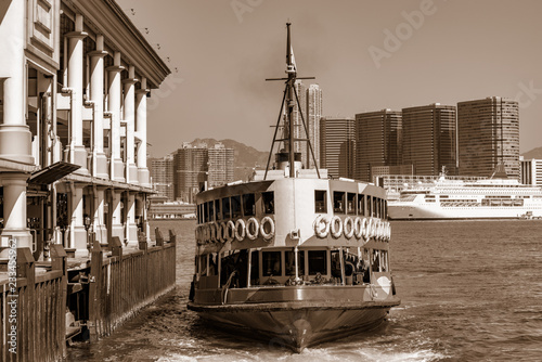 Old passenger ferry by the pier. Hong Kong. photo