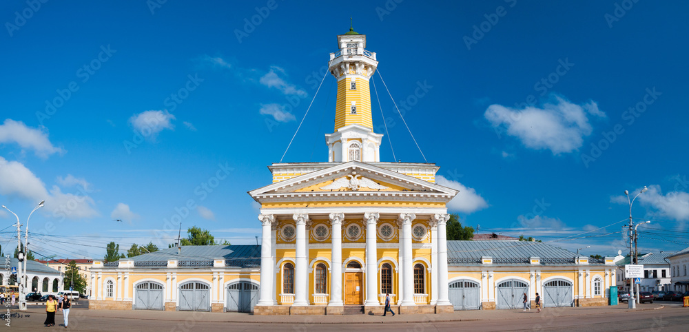 Kostroma, Russia - July 9, 2013: Fire Tower. View of the streets of the old Russian city