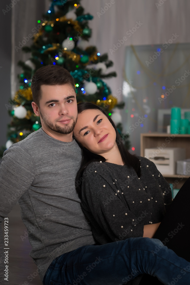 Happy couple on romantic evening before Christmas Happy couple on romantic evening before Christmas