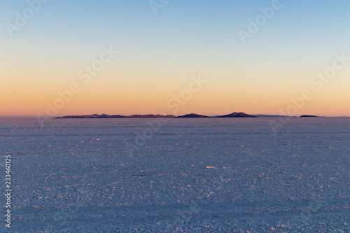 Salar de Uyuni Salt Flat Panorama at sunset in the Altiplano, Bolivia