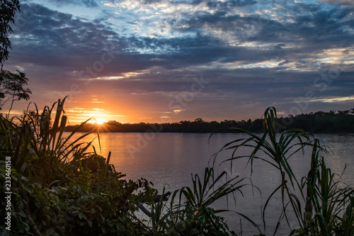 Sunset over the Tambopata River in the Amazonas Region near Puerto Maldonado, Peru