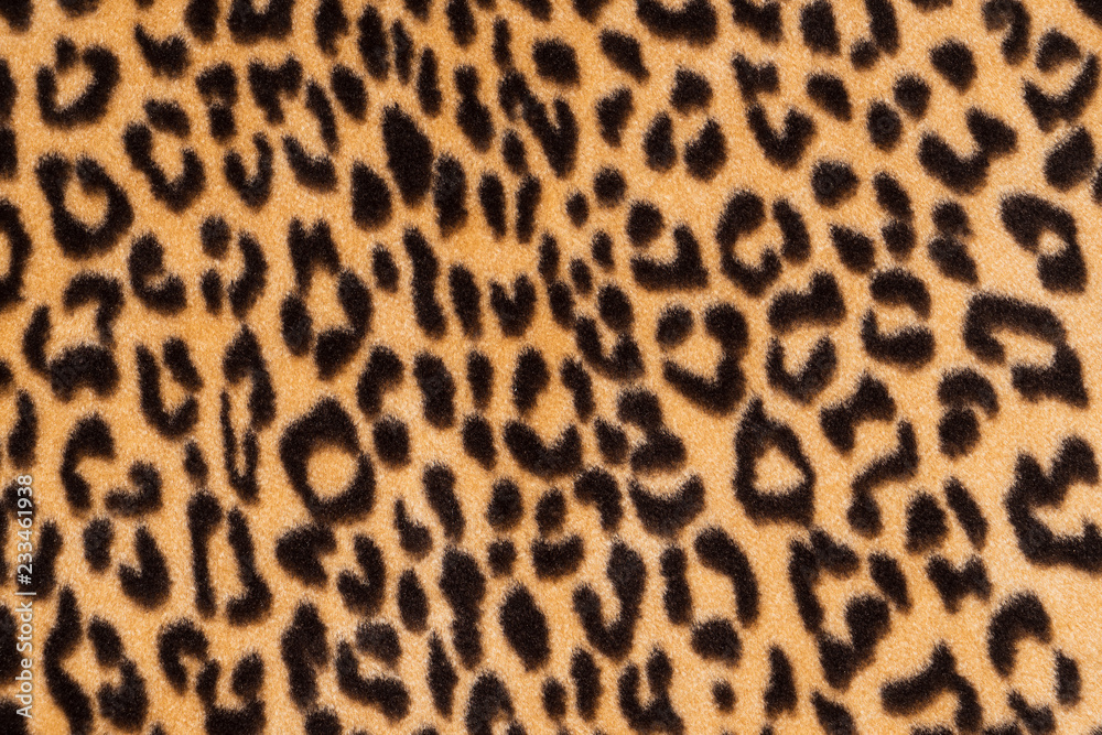 Faux fur leopard texture background. Fashionable modern ecological material. Faux fur leopard texture background. Fashionable modern ecological material.