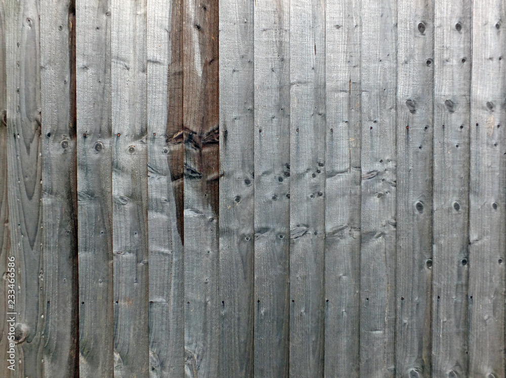 grey timber background wall made of old textured grainy wooden planks grey timber background wall made of old textured grainy wooden planks