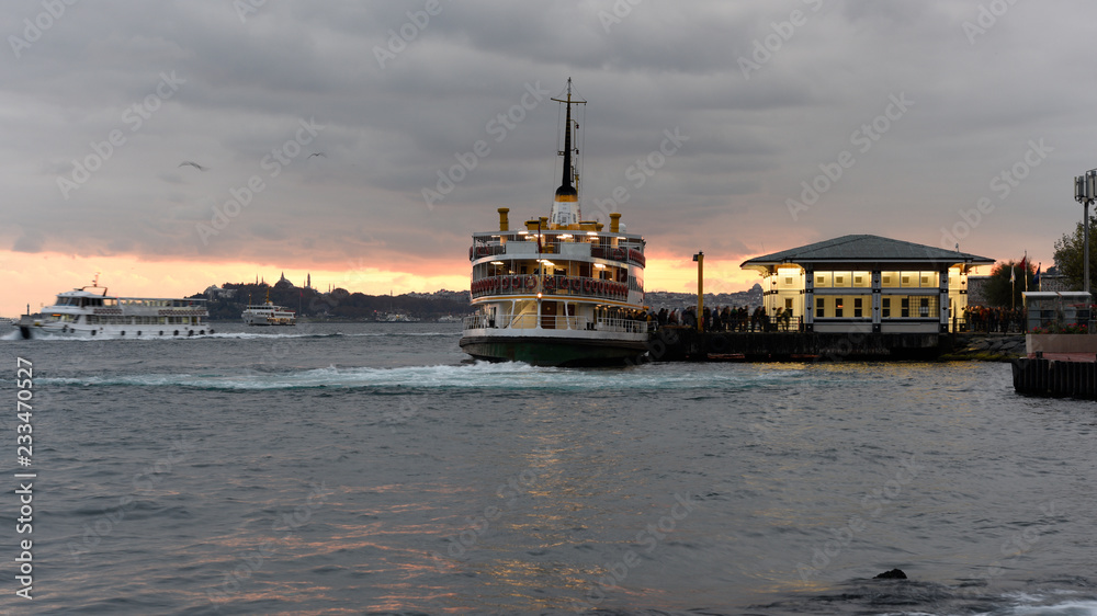 Ferry boat on pier in Istanbul Bosphorus.